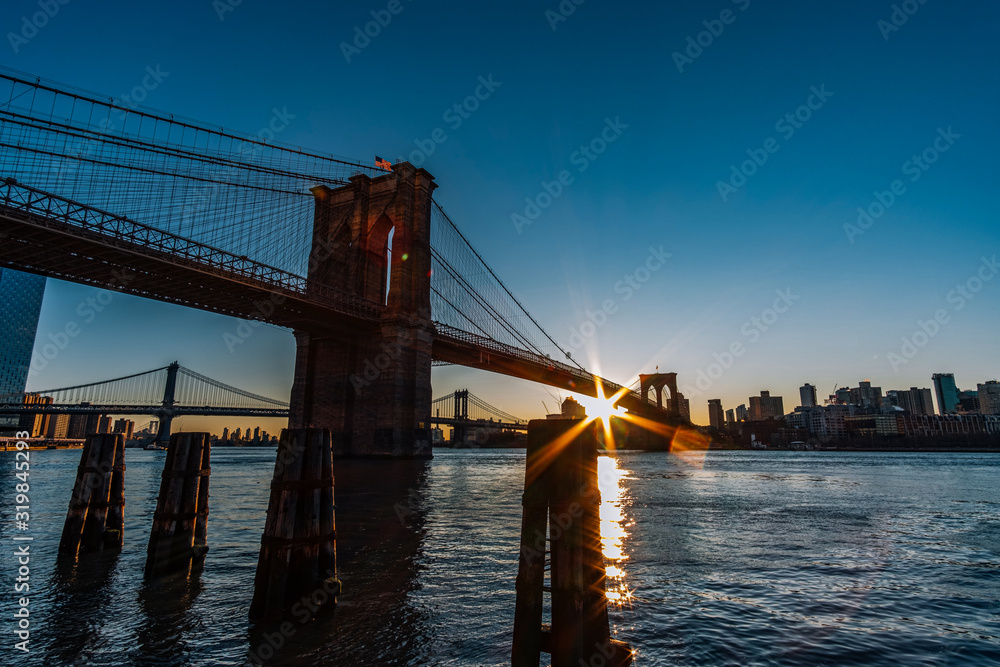 Sunrise at Brooklyn Bridge and Dumbo View from Lower Manhattan East River Side
