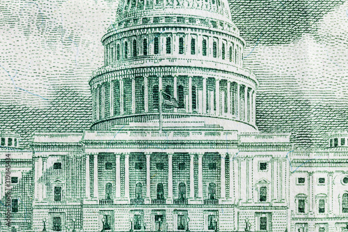 Macro close up photograph of the US Capitol buildingon the fifty dollar bill. photo