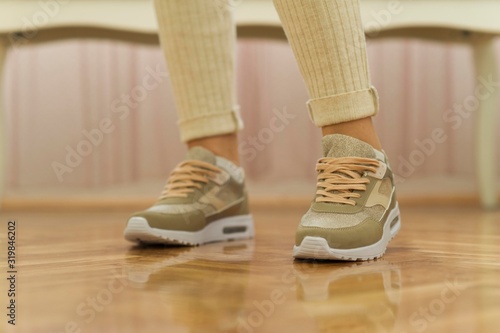 girl in fashionable sport sneakers.