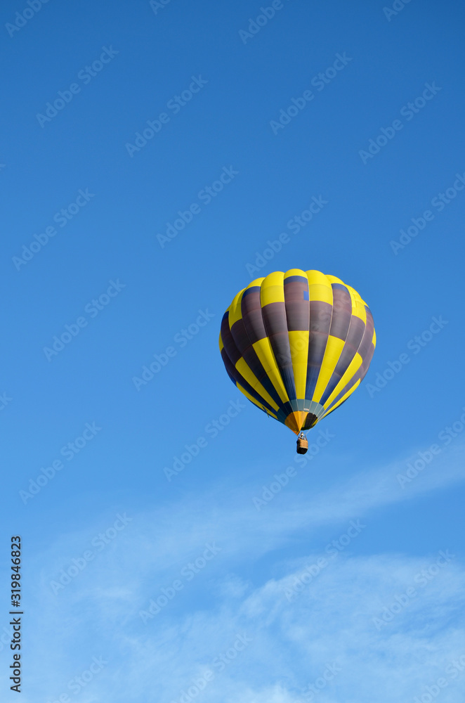 bright hot air balloon against the blue sky bright hot air balloon against the blue sky