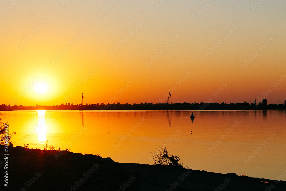 Naklejka premium sunset on river