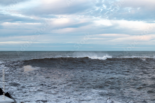 Big ocean wave approaching the coast in Donostia, San Sebastian, Spain