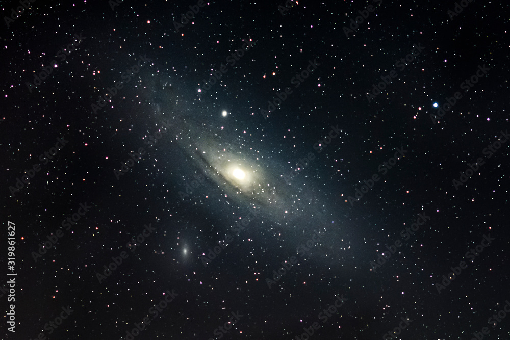 A view of Andromeda spiral Galaxy (M31) and its companions M32 and M110 Galaxies. Billions of stars live on this three galaxies and inside it bright galactic core a black hole resides
A view of Andromeda spiral Galaxy (M31) and its companions M32 and M110 Galaxies. Billions of stars live on this three galaxies and inside it bright galactic core a black hole resides