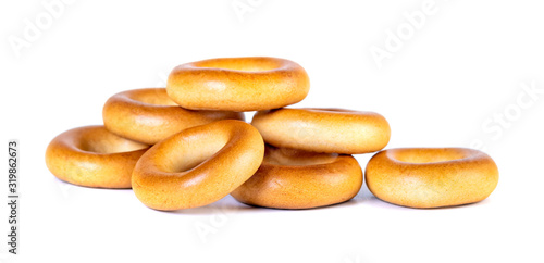 Small dry bagels, small rolls on a white background