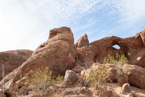 Mountain Range of Red Rocks with a Blue Sky