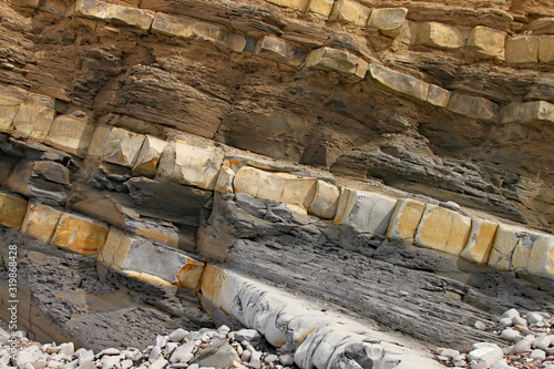 Kilve beach near East Quantoxhead in Somerset, England. The huge exposed layers of rock date back to the Jurassic era and are a paradise for fossil hunters