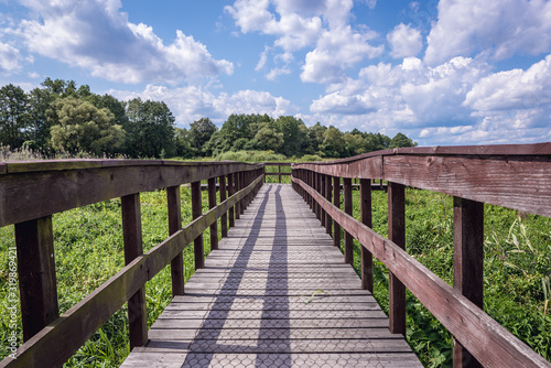 Wooden pathway for tourists in Narew National Park, close to the park authorities headquarters in Kurowo village, Poland