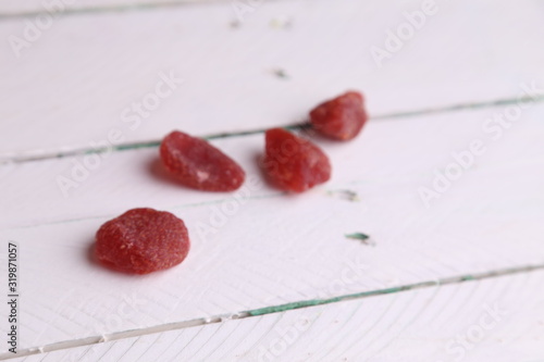 piece of dried strawberries fruit in color background