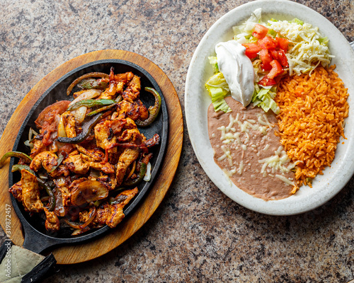 Chicken fajitas and beans Mexican Dish