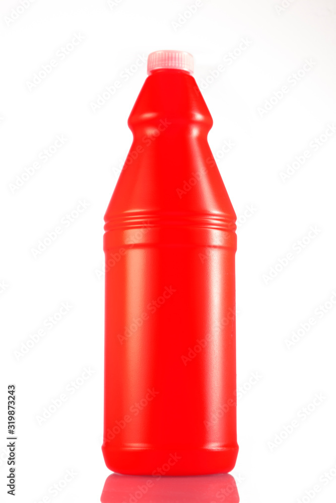 Red bottle with cleaning product isolated on white background Red bottle with cleaning product isolated on white background