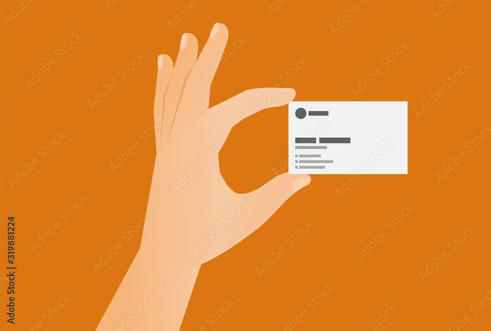 Hand holding a business card template with space for text isolated on orange background.