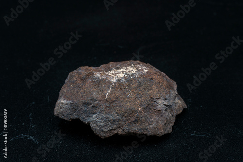Chondrite Meteorite L6W2 Type isolated, piece of rock formed as an asteroid in the universe at during Solar System creation. The meteorite comes from an asteroid fall impacting Earth at Atacama Desert © abriendomundo