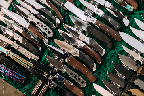 Assortment of hunting knives on sale in the market