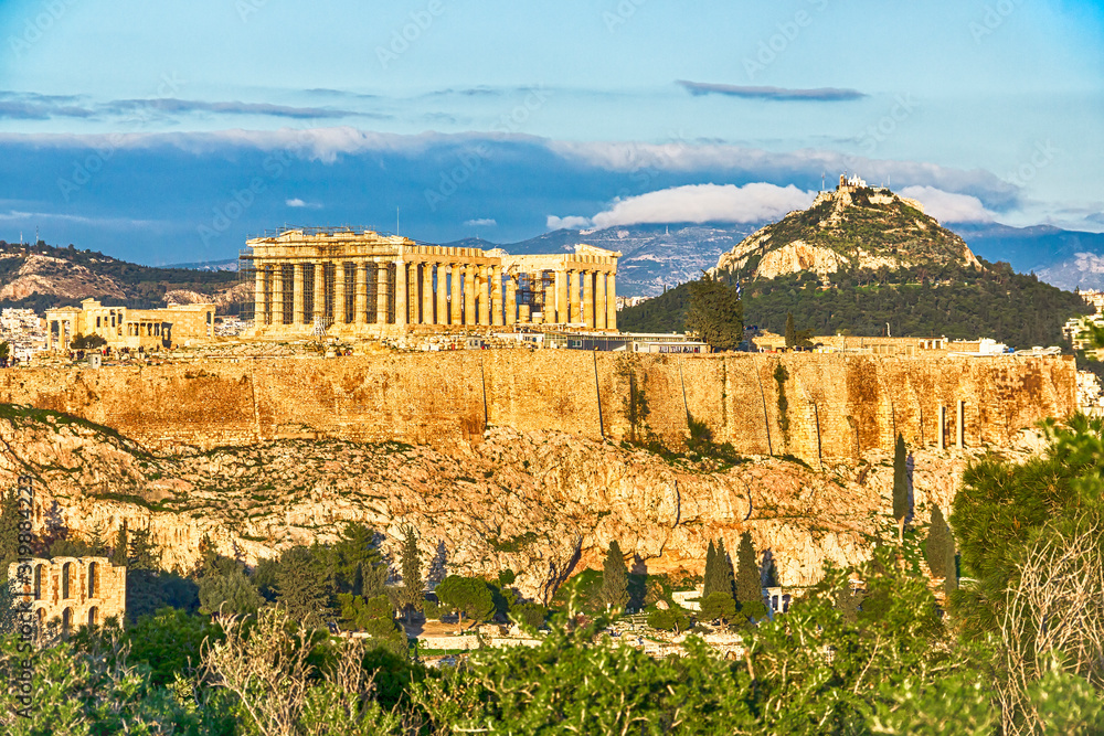 Naklejka premium Acropolis Hill with Parthenon and Mount Lycabettus in Athens, Greece