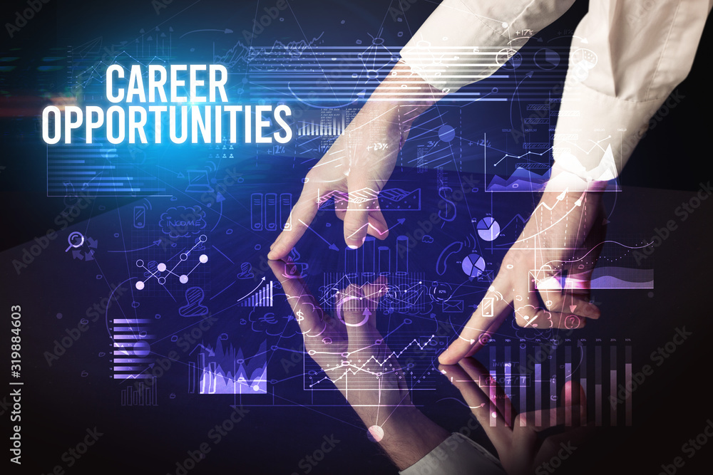 Businessman touching huge screen with CAREER OPPORTUNITIES inscription, cyber business concept Businessman touching huge screen with CAREER OPPORTUNITIES inscription, cyber business concept