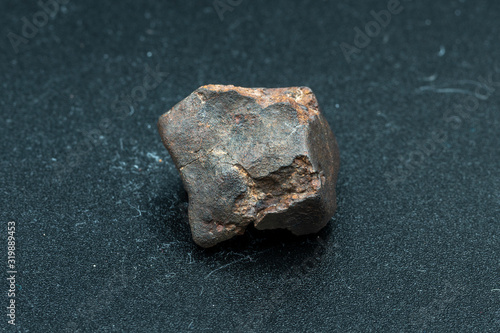 Chondrite Meteorite L6W2 Type isolated, piece of rock formed as an asteroid in the universe at during Solar System creation. The meteorite comes from an asteroid fall impacting Earth at Atacama Desert photo