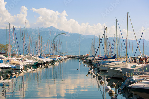 Lausanne, Switzerland - August 26, 2016: Marina with yachts in Lake Geneva in Lausanne, Ouchy fishing village, Switzerland