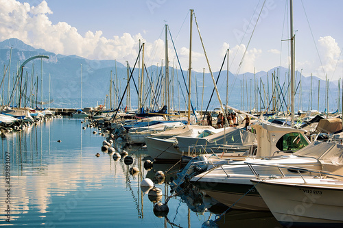 Lausanne, Switzerland - August 26, 2016: Marina and yachts at Lake Geneva in Lausanne, Ouchy fishing village, Switzerland
