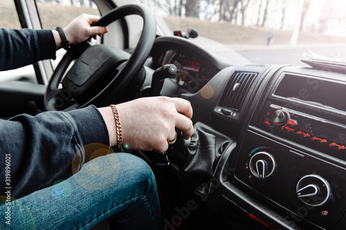 Trucker driving during the day. © velimir