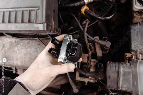 replacing the ignition coil of a car.
