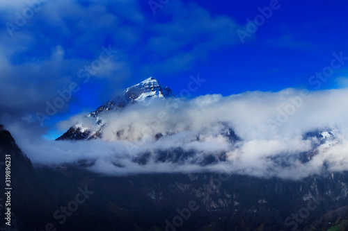 clouds and mountains with a lake in foreground near Brunnen © Peter Hofstetter