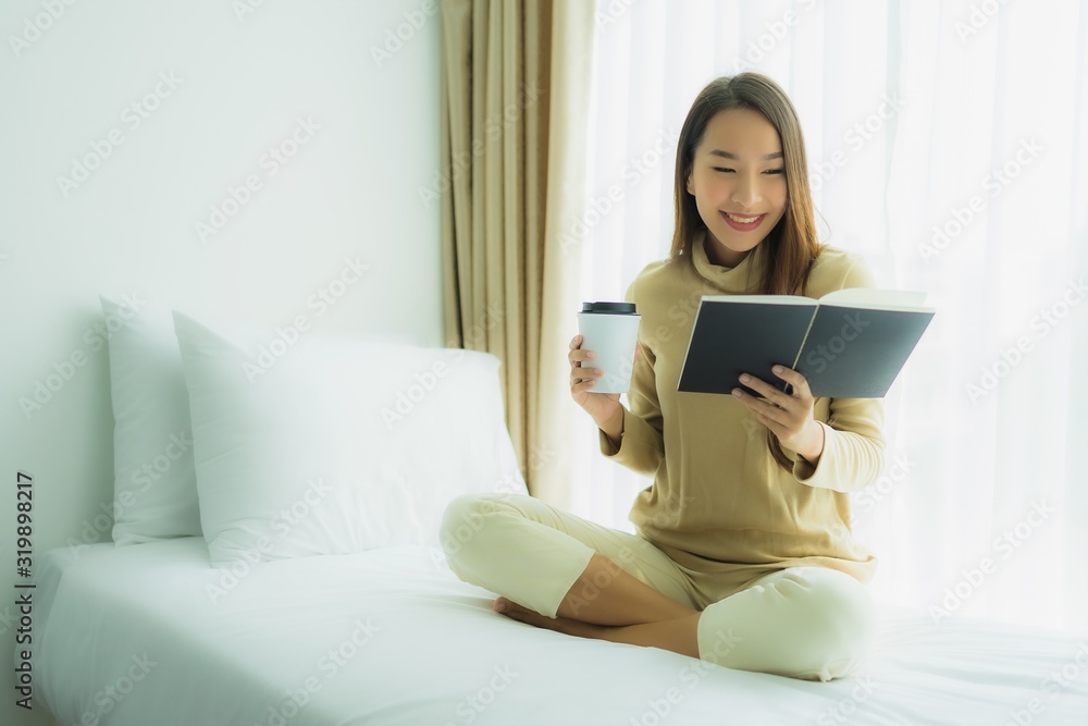 Young asian woman with coffee cup and read book Young asian woman with coffee cup and read book