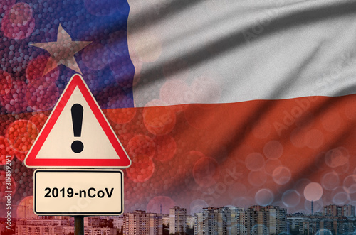 Chile flag and Coronavirus 2019-nCoV alert sign. Concept of high probability of novel coronavirus outbreak through traveling tourists photo