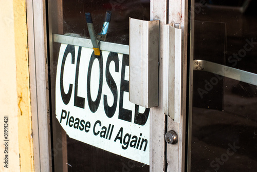 Closed sign on empty business photo