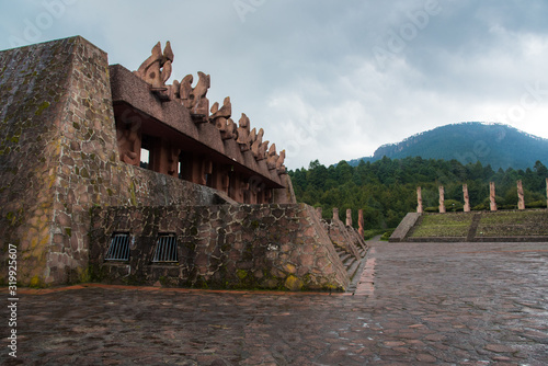 Otomi Ceremonial center, Temoaya, Mexico State,Toluca / Mexico -Sep 08 2018 cones structures representing a generation of Otomis, and on each is a sculpture of Tata Jiade, the Sun photo