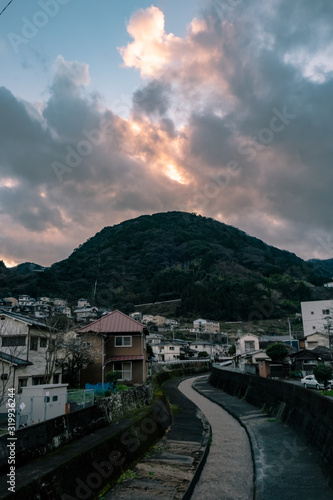 the small japanese town with a twilight mountainous background photo