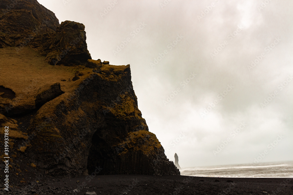 Town of Vik black sand beach beautiful rock formations mountain