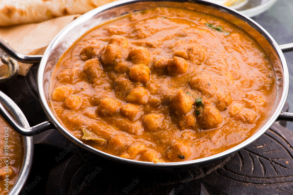 Chana Masala: Traditional Indian dish with chickpeas and curry Chana Masala: Traditional Indian dish with chickpeas and curry