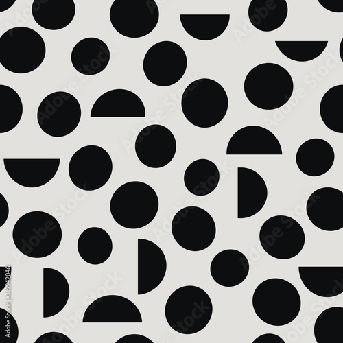 Black and white abstract geometrical seamless vector pattern with dots and half dots. Trendy abstract design for paper, cover, fabric, interior decor, wallpaper and other projects.