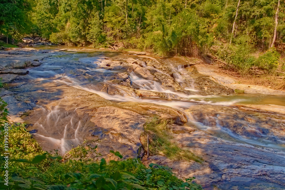 Fototapeta premium Wide mountain stream in dry season