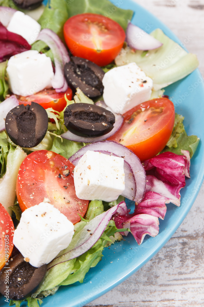 Fresh greek salad with feta cheese and vegetables. Best food for dieting and slimming Fresh greek salad with feta cheese and vegetables. Best food for dieting and slimming