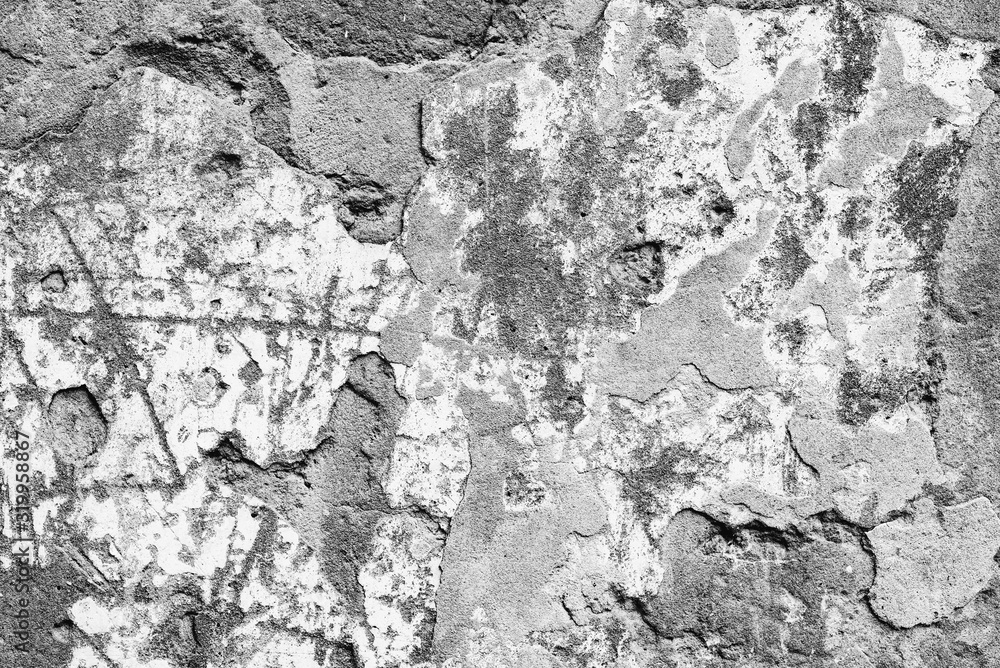 Obraz premium Texture of a concrete wall with cracks and scratches which can be used as a background