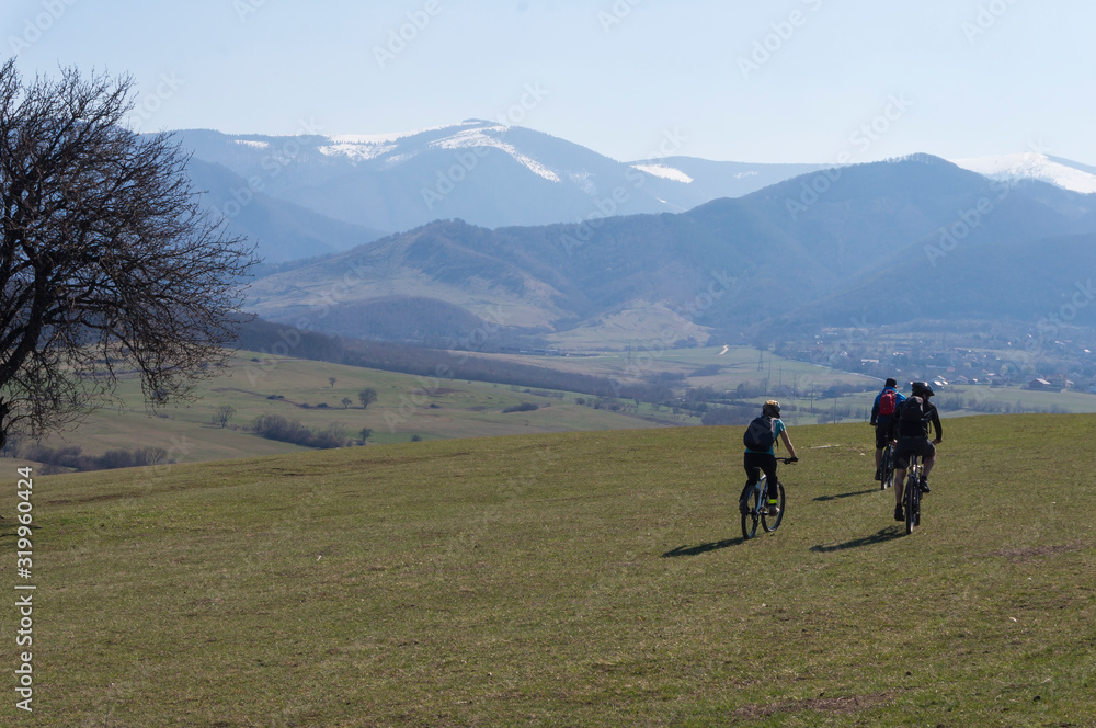 Mountain bikers in alpine landscape. Sport, Mountain Bike cyclist riding 