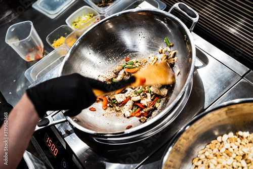 chef cooking in the restaurant photo