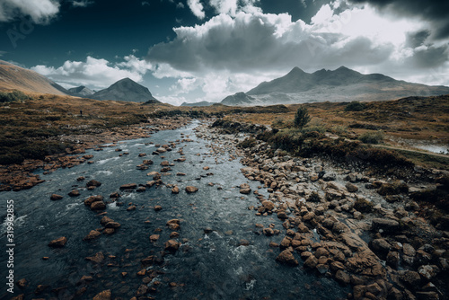 Foggy rocky river of the Sligachan mountain range in Isle of Skye