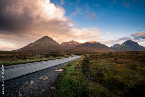 Road towards the Scottish highland mountains and forest