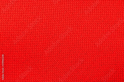 orange high detailed textured cotton fabric or cloth textile background for design. red canvas texture, structured fabric ,wool cotton element ,silk pattern