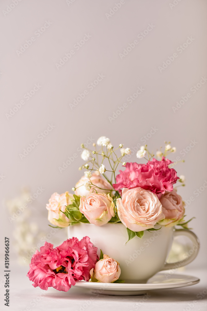 Bouquet of flowers in a cup. Copy space for your text Bouquet of flowers in a cup. Copy space for your text