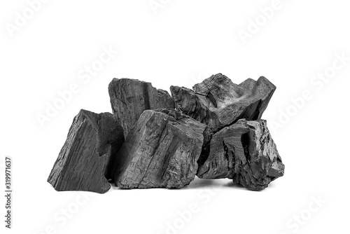 Natural wooden charcoal or traditional hard wood charcoal isolated on white background.