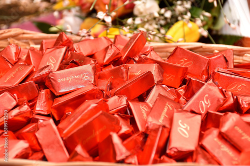 giandujotti basket, typical Italian chocolates, red wrapped with greeting 50 and Loredana