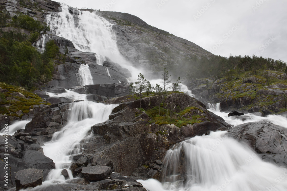 long time exposure of the powerful Tvindefossen in Norway long time exposure of the powerful Tvindefossen in Norway