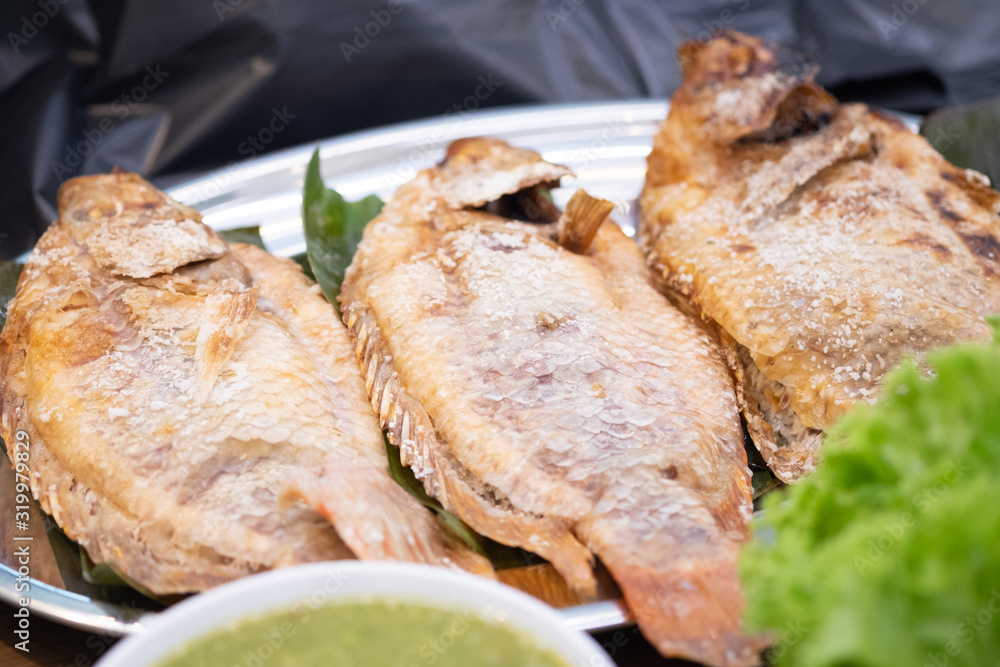 Tilapia grilled with salt in Thai style food Tilapia grilled with salt in Thai style food