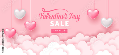 Valentines day holiday banner design with paper cut clouds and realistic heart shapes. © girafchik