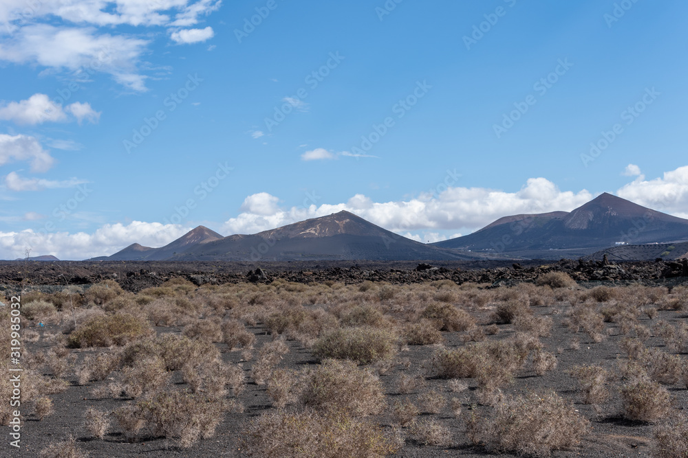 Volcanic landscape of Timanfaya National Park on island Lanzarote Volcanic landscape of Timanfaya National Park on island Lanzarote