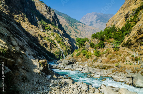 Deep mountain Marshyangdi river valley. Annapurna circuit trek, Nepal.