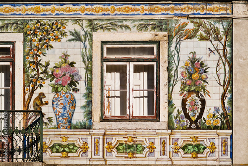 facade covered with azulejos tiles from the Fabrica Viuva Lamego in Lisbon, Portugal